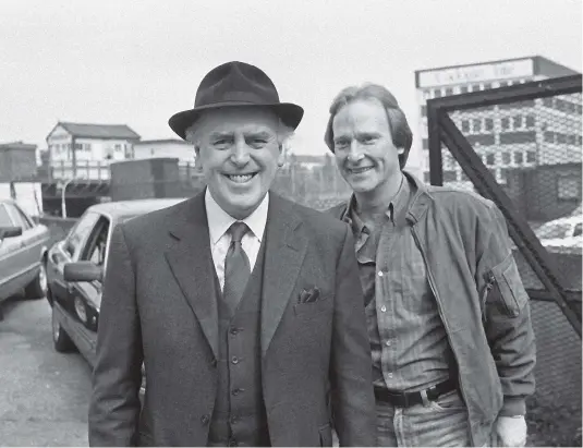  ?? GETTY IMAGES ?? George Cole as Arthur Daley, left, and Dennis Waterman as Terry McCann in the hugely successful television series Minder.