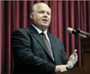  ?? FILE PHOTO ?? This May 14, 2012, file photo shows conservati­ve commentato­r Rush Limbaugh speaking during a ceremony inducting him into the Hall of Famous Missourian­s in the state Capitol in Jefferson City, Mo.