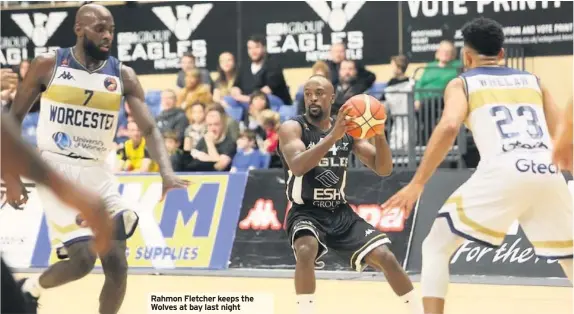  ??  ?? Rahmon Fletcher keeps the Wolves at bay last night