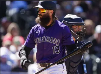  ?? DAVID ZALUBOWSKI — THE ASSOCIATED PRESS ?? Rockies right fielder Charlie Blackmon turns and walks back to the dugout after striking out against Tampa Bay Rays starting pitcher Ryan Pepiot in the sixth inning on Sunday at Coors Field.