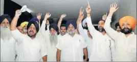  ?? KESHAV SINGH/HT ?? Shiromani Akali Dal chief Sukhbir Singh Badal and other party leaders protesting outside the Punjab Vidhan Sabha in Chandigarh on Wednesday.
