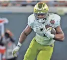  ?? ?? Notre Dame running back Audric Estime pulls in a pass during a victory over South Carolina on Dec. 30.