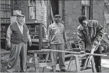  ?? DAVID LEE/PARAMOUNT PICTURES ?? Stephen McKinley Henderson, from left, Denzel Washington and Jovan Adepo in “Fences,” which is set in Pittsburgh.