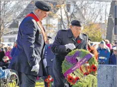  ?? COLIN CHISHOLM ?? Veteran Leonard Newland lays the wreath on behalf of MLA Chuck Porter and the government of Nova Scotia.