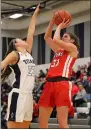  ?? RANDY MEYERS — FOR THE MORNING JOURNAL ?? Megan Sutton of Firelands puts up a baseline shot over Lorain’s Mackenzie Barricklow during the second quarter Feb. 10.