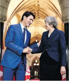  ?? JUSTIN TANG / THE CANADIAN PRESS FILES ?? Prime Minister Justin Trudeau shakes hands with British Prime Minister Theresa May as she leaves Parliament Hill in Ottawa last September.