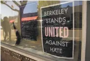  ?? Michael Macor / The Chronicle ?? A sign in the window at Elmwood Cafe in Berkeley, which closed Friday, responds to racial tensions.