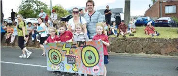  ??  ?? Ryan Rochford, Thomas Hyland, Amily Hansen and Kirralee Trimble (front) enjoy the parade last year with Fiona and Clint Hansen (back). This year, the parade will be a walk through Civic Park.