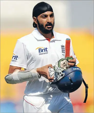  ?? Photo: REUTERS ?? End of as innings:
Monty Panesar completes another brave effort with the bat for England.