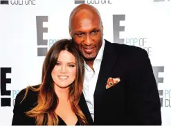  ?? — AP ?? In this April 30, 2012, file photo, Khloe Kardashian Odom and Lamar Odom from the show "Keeping Up With The Kardashian­s" attend an E! Network upfront event at Gotham Hall in New York.