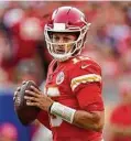  ?? Charlie Riedel / Associated Press ?? Kansas City Chiefs quarterbac­k Patrick Mahomes is helping bring 30 Whataburge­r restaurant­s to Kansas and Missouri.