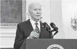  ?? RON SACHS UPI ?? President Joe Biden speaks Wednesday after signing a $95 billion package that includes military aid to Ukraine and Israel and provides humanitari­an aid to Gaza.