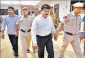  ??  ?? Regional head of Ryan Group of Institutio­ns Francis Thomas (in white shirt) and HR head Jayesh Thomas (grey shirt) at the court premises in Sohna on Monday. SANJEEV VERMA/HT PHOTO