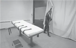  ?? KIICHIRO SATO/AP ?? Costly trials, at a time when death sentences are fading, should make residents want to know how much more it’s costing Florida to seek the extreme penalty than to accept life without parole as an equally effective way of protecting society, writes columnist Martin Dyckman.