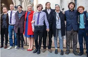  ?? ?? STAND The nine Insulate Britain activists at the Royal Courts of Justice in London yesterday