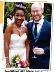  ??  ?? SAVOURING LIFE AGAIN: Nnenna and husband Mark on their wedding day