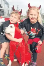  ?? Picture: Angus Findlay. ?? Little devils Jake, 4, and Elena, 6, Sanderson with their dog Watson.