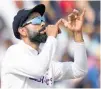  ?? Photo / AP ?? Virat Kohli mocked the England fans in the Barmy Army by mimicking playing a trumpet as his team rolled past the hosts in the fourth test.