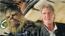  ?? FILM FRAME/ LUCASFILM VIA THE ASSOCIATED PRESS ?? Star Wars: The Force Awakens this week topped US$2 billion in global box office receipts.