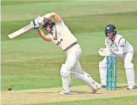  ?? ?? Poised: Jamie Smith, of Surrey, goes on the attack during his maiden double century