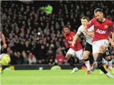  ??  ?? AFP Ryan Giggs, who set his team on the road to victory with a penalty, is one of only three Manchester United players with an FA Cup winners’ medal.