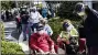  ?? ANDREW WEST /THE NEWS-PRESS VIA AP ?? Joel and Susan Pittelman, from Naples, Fla., wait in line to receive COVID-19 vaccines on Tuesday, Dec. 29, 2020, at East County Regional Library in Lehigh Acres, Fla.