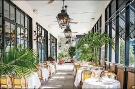  ?? CONTRIBUTE­D BY MIA YAKEL ?? With its tropical veranda, Le Colonial aims to take you back to 1920s French Colonial Vietnam.