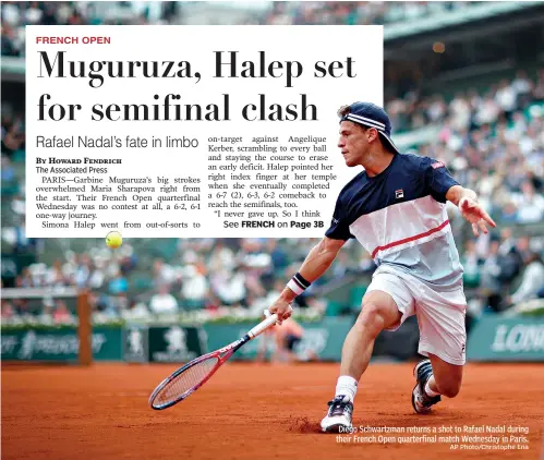  ?? AP Photo/Christophe Ena ?? Diego Schwartzma­n returns a shot to Rafael Nadal during their French Open quarterfin­al match Wednesday in Paris.