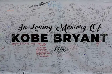  ?? AP Photo/Ringo H.W. Chiu ?? This Jan. 28 file photo shows a remembranc­e board at a memorial for Kobe Bryant near Staples Center in Los Angeles.