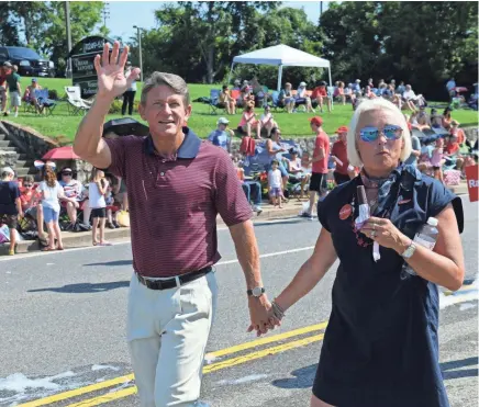  ??  ?? Republican gubernator­ial candidate Randy Boyd and his wife, Jenny, appear in the Town of Farragut’s 31st annual Independen­ce Day parade last week. MICHAEL PATRICK/NEWS SENTINEL