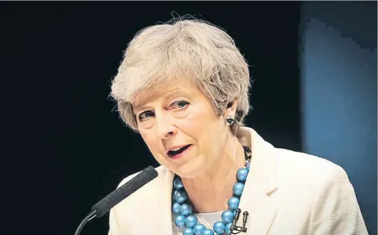  ?? ANDY BUCHANAN / AFP ?? Theresa May se dirige a un auditorio de conservado­res escoceses en Aberdeen