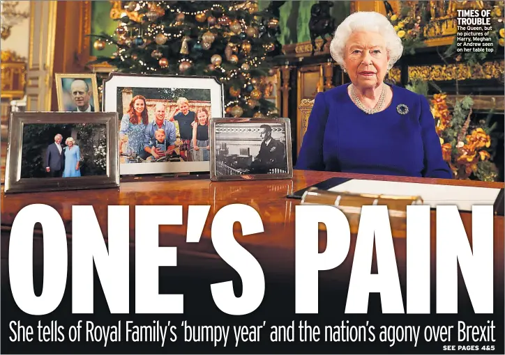  ??  ?? TIMES OF TROUBLE The Queen, but no pictures of Harry, Meghan or Andrew seen on her table top