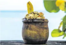  ??  ?? El mofongo de plátanos frescos es solo una muestra del sabor que brinda Ladi’s Place.