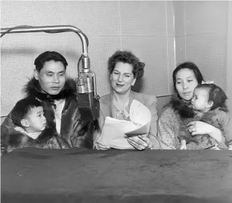  ??  ?? Top Left: Claire Wallace interviews Herbert Anungazuk, Toby Anungazuk, Martha Anungazuk, and Nellie Anungazuk. The family lived in Wales, Alaska, the northernmo­st village in North America. Top Right: Martha Bowes. Bottom Right: Michelle Tisseyre on her radio debut at the Canadian Broadcasti­ng Corporatio­n.