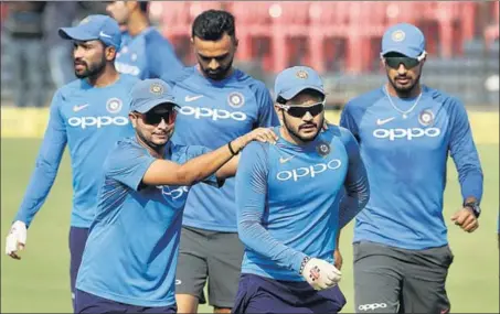  ??  ?? India's Kuldeep Yadav (left) and Manish Pandey during training at the Barabati Stadium in Cuttack on Tuesday.