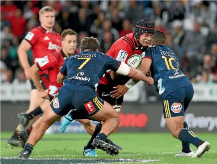  ?? GETTY IMAGES ?? Crusaders No 8 Jordan Taufua had a try ruled out when TMO Glenn Newman controvers­ially decided that Tim Bateman had knocked the ball on earlier in the movement. The Highlander­s won 25-17 in Dunedin on Saturday night.