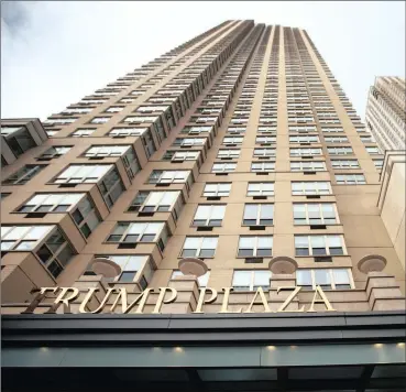  ?? PHOTO: BLOOMBERG ?? The Trump Plaza Residence building next to Trump Bay Tower in Jersey City, US. Trump Bay Street is a 50-storey luxury apartment building built by Kushner Companies, whose chief executive officer, Jared Kushner, is married to Trump’s daughter Ivanka.