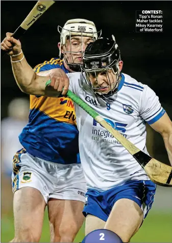  ??  ?? CONTEST: Tipp’s Ronan Maher tackles Mikey Kearney of Waterford