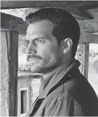  ??  ?? Cavill rocks the mustache and the mean as Walker – a far cry from his day job as Superman.