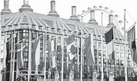  ?? ALBERTO PEZZALI/AP ?? NATO member flags fly in Parliament Square ahead of this week’s summit in London.
