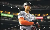  ?? CHRISTIAN PETERSEN — GETTY IMAGES ?? Marlins outfielder Giancarlo Stanton has vetoed a trade to the Giants or St. Louis Cardinals after new owners in Miami reportedly had agreed to trade parameters with both clubs. Stanton, who has $250 million remaining on his contract, led the majors in...