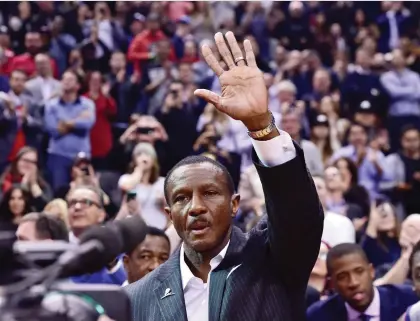  ??  ?? Ex-Raptors head coach Dwane Casey waves to the crowd Wednesday before his Pistons beat Toronto 106-104.