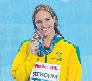  ?? Picture: GETTY IMAGES ?? Emily Seebohm with her bronze medal for the 200m backstroke in China.