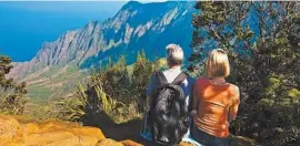  ?? Courtesy Hawaii Tourism Authority ?? Hiking Kauai’s Napali Coast