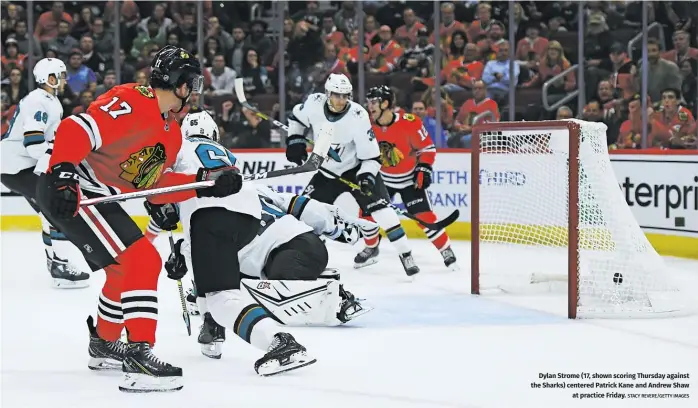  ?? STACY REVERE/GETTY IMAGES ?? Dylan Strome (17, shown scoring Thursday against the Sharks) centered Patrick Kane and Andrew Shaw
at practice Friday.