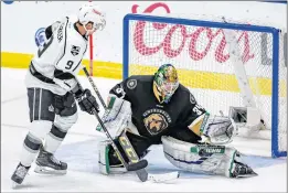  ?? NEWFOUNDLA­ND GROWLERS PHOTO/JEFF PARSONS ?? Newfoundla­nd Growlers goaltender Michael Garteig stops the Manchester Monarchs’ Sam Kurker from in close during ECHL action at Mile One Centre Saturday night. It was one of 44 saves made by Garteig in a 3-0 shutout victory.