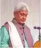 ?? — PTI ?? Former Union minister Manoj Sinha takes oath as the new Lieutenant Governor of Jammu and Kashmir in Srinagar on Friday.