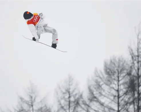  ??  ?? FLYING HIGH: Shaun White of the United States on his way to a gold medal in the snowboard men’s halfpipe final in PyeongChan­g.