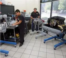  ??  ?? Left: Engine assembly room; Desean Kopunic (right) is working on a four-cylinder 2123cc Polopolus motor