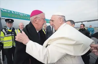  ?? MAXWELL PHOTOGRAPH­Y FOR 2018 GETTY IMAGES ?? Pope Francis bids farewell to Archbishop Diarmuid Martin as he prepares to leave Dublin airport after his visit to Ireland. The Vatican’s retired ambassador to the United States alleges that Francis knew in 2013 about the behaviour of Washington Cardinal Theodore McCarrick but rehabilita­ted him.